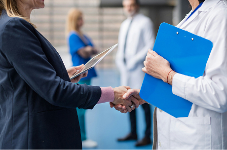 shaking hands with a doctor
